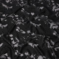 Black synthetic Brocade Fabric with tonal abstract cutwork jacquard and charcoal grey accents, 140 Cms Width, Turkey-D25280