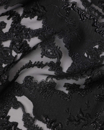 Black synthetic Brocade Fabric with tonal abstract cutwork jacquard and charcoal grey accents, 140 Cms Width, Turkey-D25280