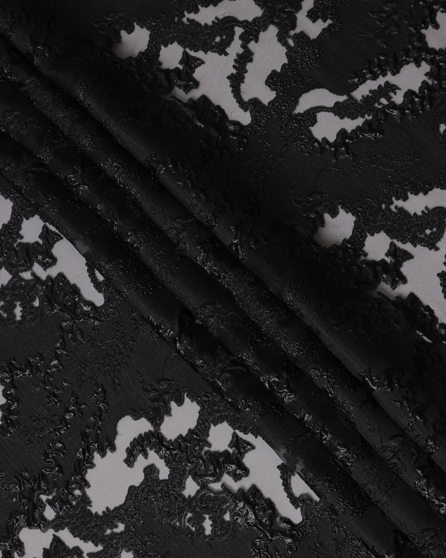 Black synthetic Brocade Fabric with tonal abstract cutwork jacquard and charcoal grey accents, 140 Cms Width, Turkey-D25280