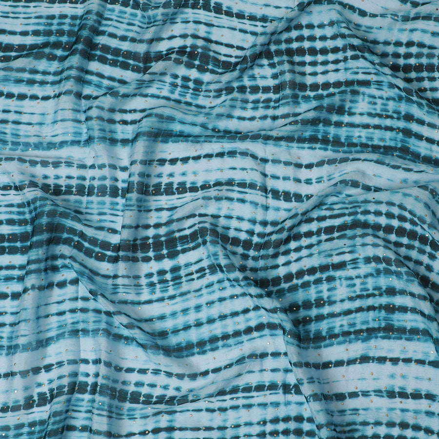 قماش شينون صناعي مصبوغ باللونين الفيروزي والأسود مع رقائق ذهبية، عرض 110 سم - D19665