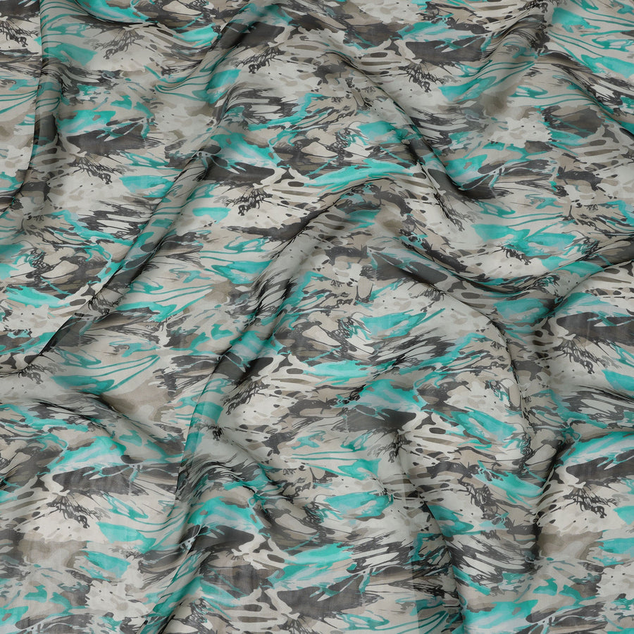 قماش أورجانزا صناعي عاجي مطبوع بضربات فرشاة تجريدية مع تأثيرات دوامة باللونين الأزرق المخضر والفحمي، عرض 110 سم، صنع في الهند - D23339