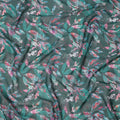 قماش فوال قطني بقاعدة بلون أزرق مخضر غامق مع طباعة ريش وأوراق تجريدية متعددة الألوان، بتصميم نباتي فني، عرض 110 سم، صنع في الهند - D23784
