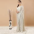 Beige and gold metallic Premium French Chantilly lace saree in floral design having stone work-D6212