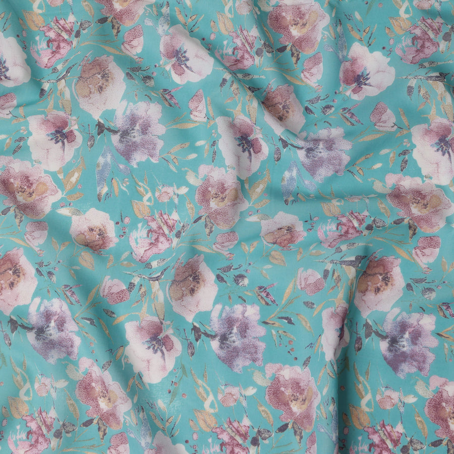 قماش قطني فيروزي بطبعة زهور متعددة الألوان – عرض 110 سم – D21554