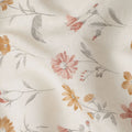 قماش قطني أبيض بطبعة زهور باللونين الخوخي والأصفر – عرض 110 سم - D21570