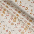 قماش قطني أبيض بطبعة زهور باللونين الخوخي والأصفر – عرض 110 سم - D21570