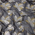 قماش شيفون حرير رمادي فحمي مع تصميم أوراق ذهبية وفضية معدنية، عرض 110 سم - D21676