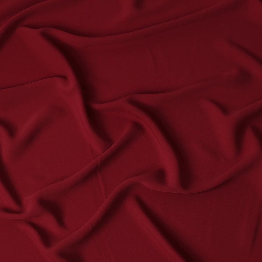 قماش كريب صناعي مطاطي سادة بلون أحمر غامق - عرض 140 سم - صنع في إندونيسيا - D22121