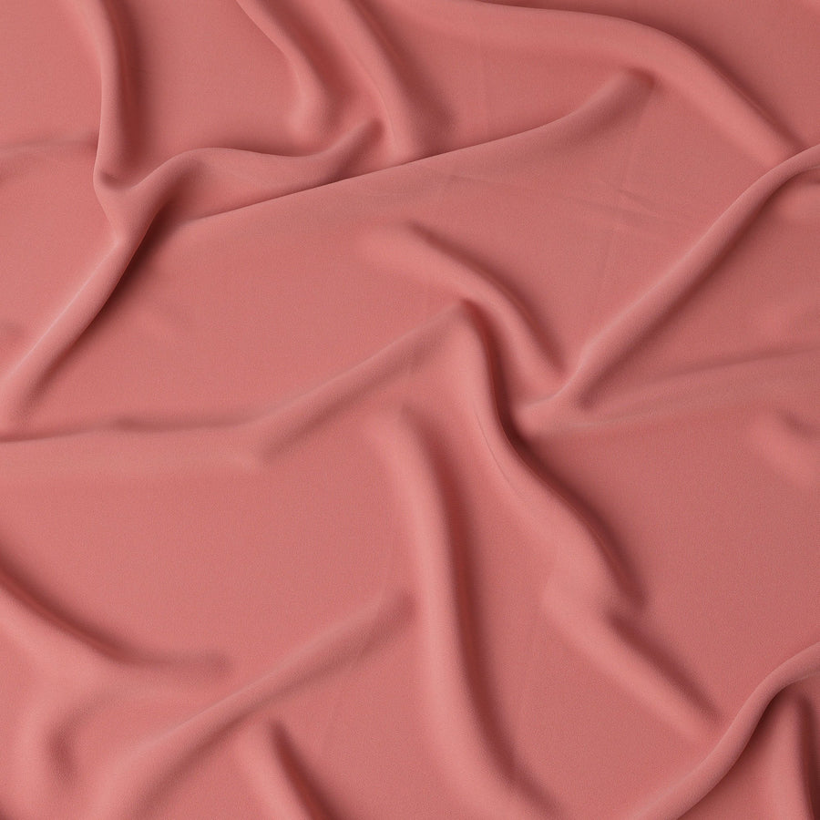 قماش كريب صناعي سادة قابل للتمدد بلون السلمون والخوخ - عرض 140 سم - صنع في إندونيسيا - D22125