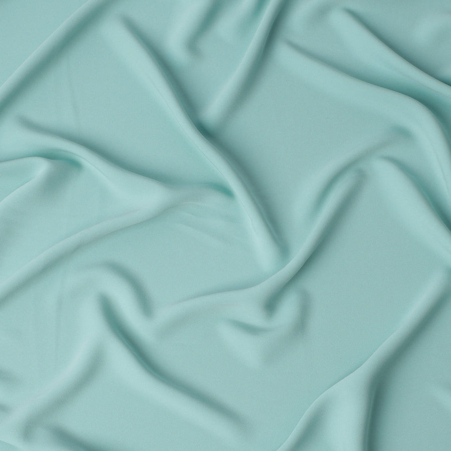 Aqua Blue Plain Synthetic Stretchable Crepe Fabric – 140 cm Wide – Made in Indonesia-D22127