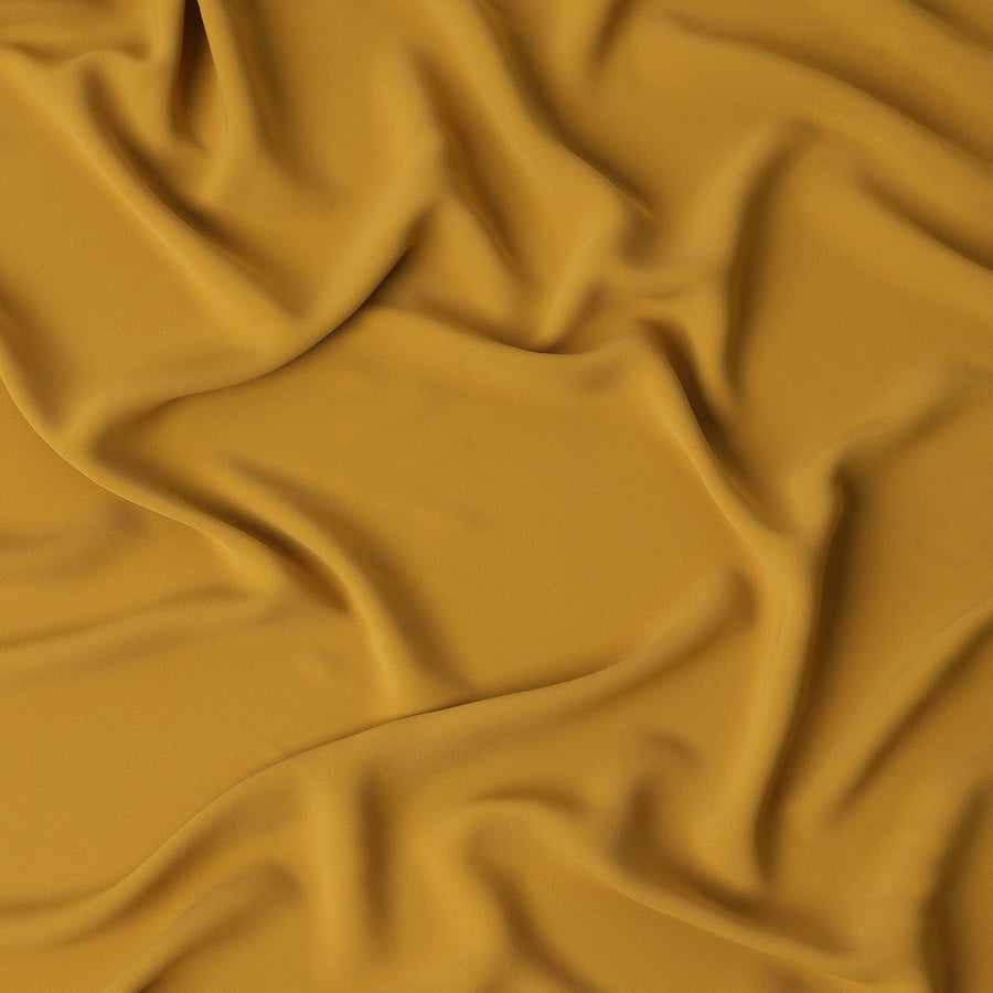 Mustard Yellow Plain Synthetic Stretchable Crepe Fabric – 140 cm Wide – Made in Indonesia-D22132