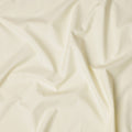 قماش قمصان قطني سويسري من البوليستر بلون أصفر عاجي سادة، عرض 150 سم، صنع في سويسرا - D22911
