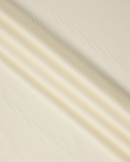 قماش قمصان قطني سويسري من البوليستر بلون أصفر عاجي سادة، عرض 150 سم، صنع في سويسرا - D22911