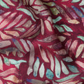 Wine Red Leaf Printed Synthetic Modal Satin Fabric with Multicolor Batik Design, 110 Cms Width, Made in India-D23122