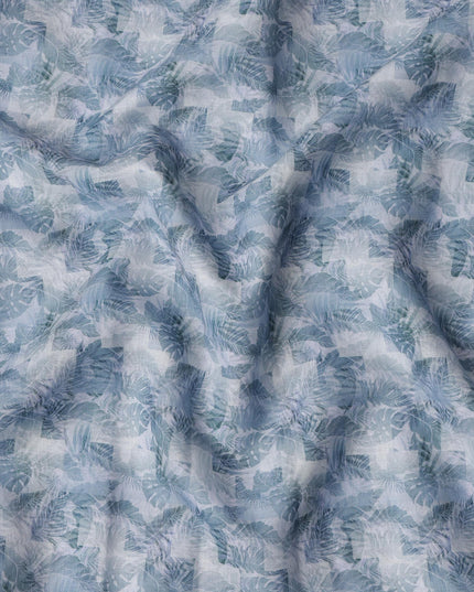 قماش كتان مخلوط بطبعة أوراق استوائية باللون الأزرق الفولاذي، تصميم متعدد الطبقات من نبات المونستيرا والنخيل بدرجات اللون الأزرق المائي والكحلي، عرض 140 سم، صنع في الهند - D23242