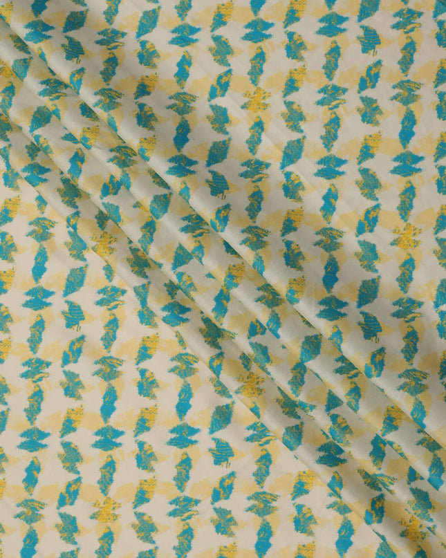Off-White with Yellow and Teal Abstract Leaf Printed Cotton Lawn Fabric, 110 Cms Width, Made in India-D23550