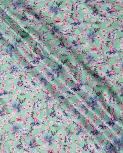 قماش فيسكوز أساسي بلون أخضر نعناعي مع طباعة زهور متعددة الألوان بدرجات اللون الوردي والأزرق والأبيض، 110 سم، الهند - D23849