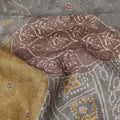 Multicolor cotton voile fabric with patchwork-inspired ethnic print in mustard, grey, and maroon tones, 110 Cms, India
-D23863