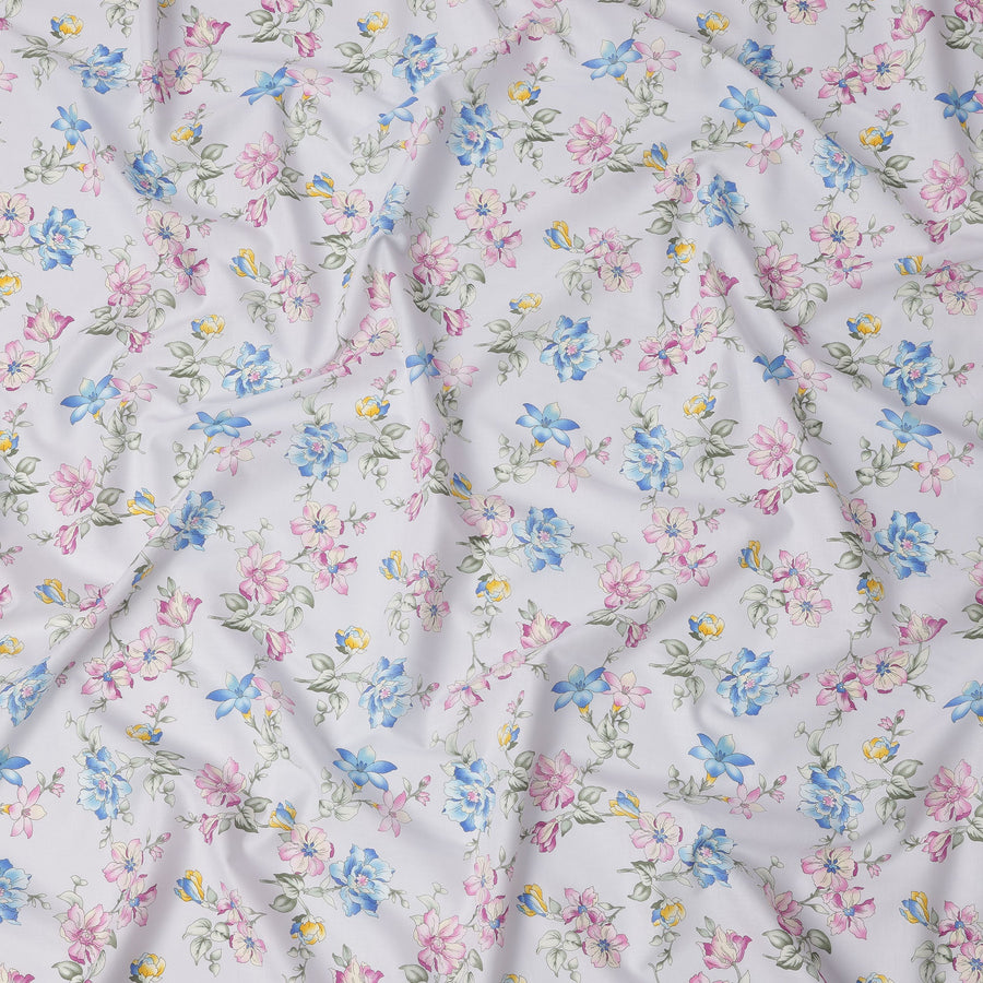White Cotton Lawn Fabric with Multicolor Floral Print in Blue, Pink, and Yellow Hues with Green Leaf Detailing, Soft Lightweight Texture, 110 Cms Width, Made in India-D22543