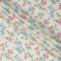 Cream Cotton Lawn Fabric with All-Over Multicolor Floral Print in Pink, Blue, and Yellow with Soft Green Leaves, Lightweight Smooth Finish, 110 Cms Width, Made in India-D22545