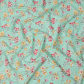 Mint Green Cotton Lawn Fabric with All-Over Floral Print in Yellow, Red, and Peach Tones with Soft Green Leaves, Smooth Lightweight Finish, 110 Cms Width, Made in India-D22547