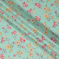 Mint Green Cotton Lawn Fabric with All-Over Floral Print in Yellow, Red, and Peach Tones with Soft Green Leaves, Smooth Lightweight Finish, 110 Cms Width, Made in India-D22547