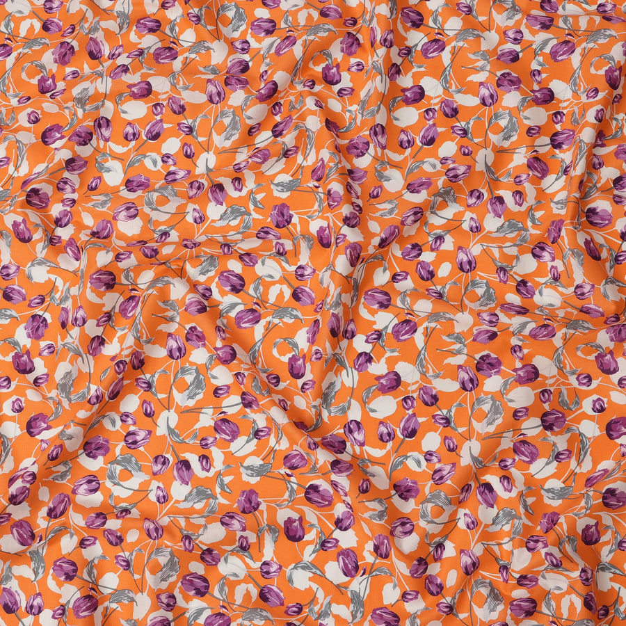 Orange Cotton Lawn Fabric with All-Over Purple Floral Print and Grey Leaf Detailing in Dense Pattern, Soft Lightweight Finish, 110 Cms Width, Made in India-D22555