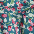 Teal Blue Cotton Lawn Fabric with All-Over Pink Floral Print and Green Leaf Motifs in Dense Pattern, Smooth Lightweight Finish, 110 Cms Width, Made in India-D22556