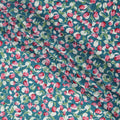 Teal Blue Cotton Lawn Fabric with All-Over Pink Floral Print and Green Leaf Motifs in Dense Pattern, Smooth Lightweight Finish, 110 Cms Width, Made in India-D22556