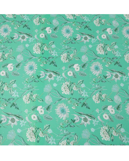 قماش حرير ساتان إيطالي فاخر بقاعدة خضراء نعناعية مع طبعة زهور نباتية باللونين الأبيض والأزرق المخضر، عرض 140 سم، صنع في إيطاليا - D22994
