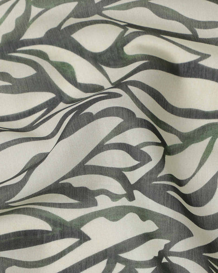 قماش فوال قطني بقاعدة عاجية، مطبوع عليه أوراق زيتونية وسوداء تجريدية، عرض 140 سم، صنع في سلوفاكيا - D23658