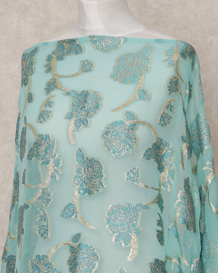 قماش ديراك حريري فاخر فرنسي صومالي فيروزي مع لوركس معدني - 3.5 متر، عرض 140 سم، صنع في فرنسا - D24584