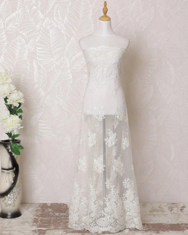 Off white nylon tulle fabric with same tone embroidery and bead work in fancy design-D15951 Regal Fabrics