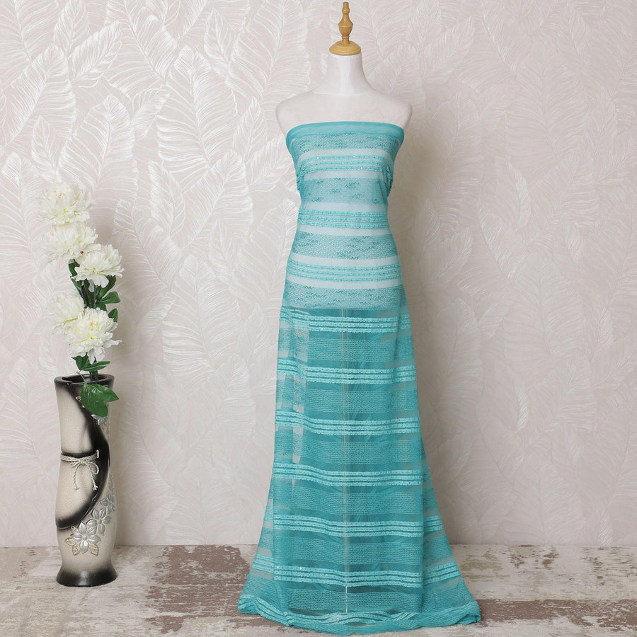 قماش تول نايلون باللون الأزرق الفيروزي مع تطريز وترتر بنفس اللون بتصميم مخطط - D15981