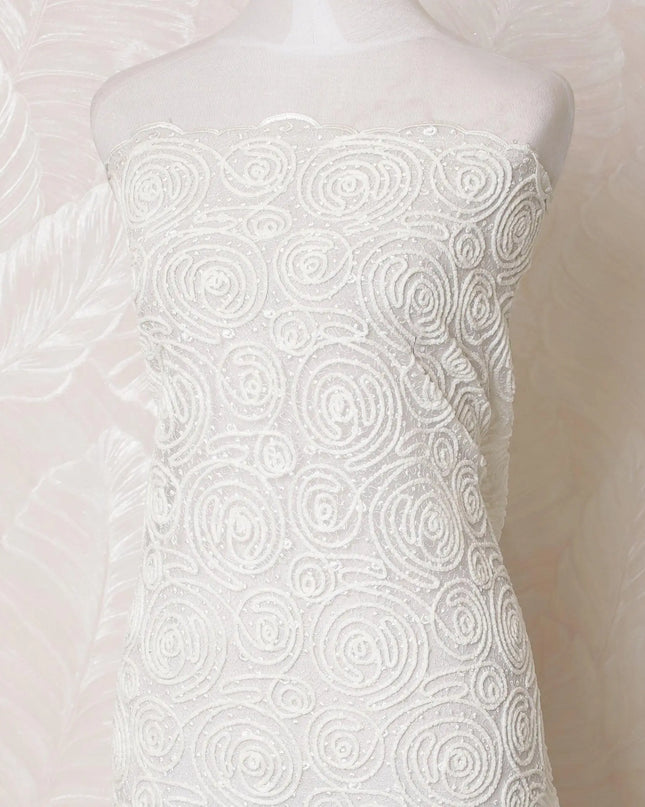 Off white nylon tulle fabric with same tone flock embroidery in fancy design-D15984 Regal Fabrics