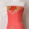 Pastel orange silk blended velvet fabric with red, gold and Kelly green print in floral design-D16043