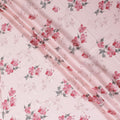 Lemonade pink synthetic crepe fabric with print in black, dark pink and green in floral design-D15654