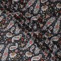 Black synthetic crepe fabric with multicolor print in paisley design-D15657
