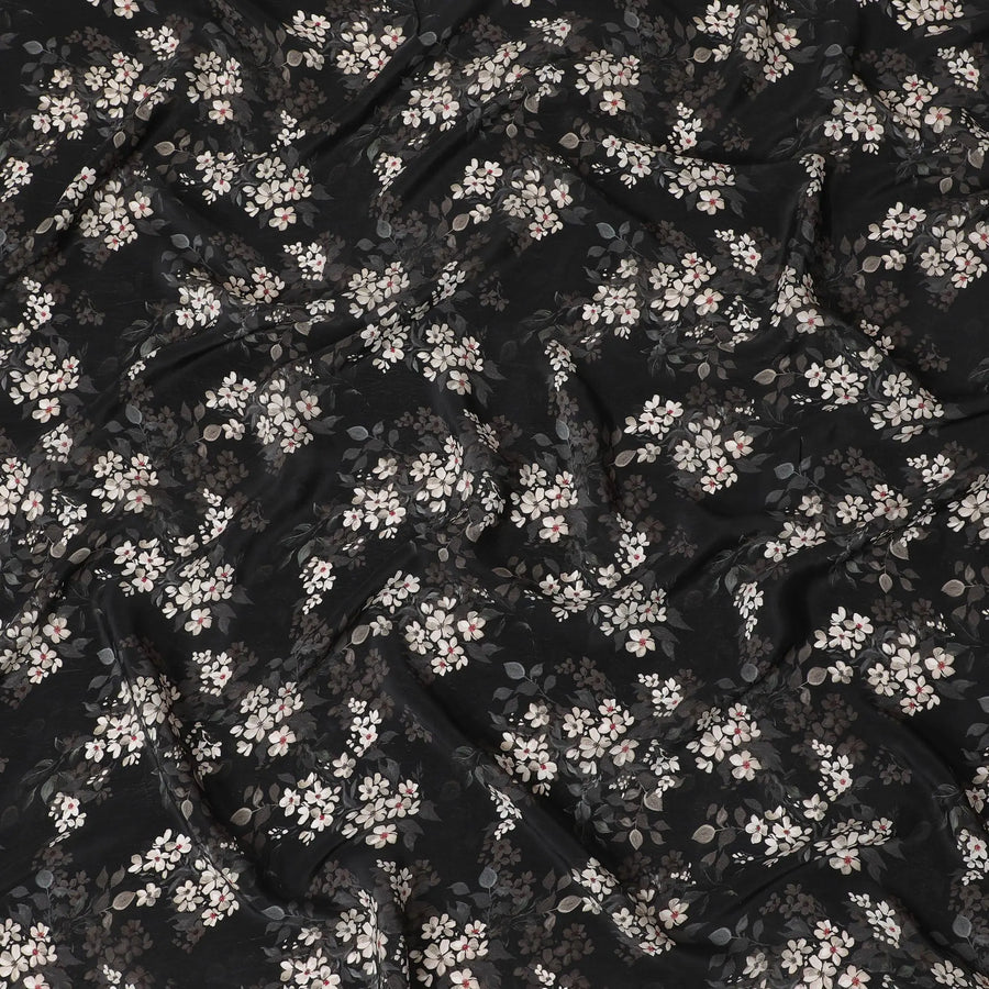 Black synthetic crepe fabric with white, light green and red digital prints in floral design-D15771 Regal Fabrics