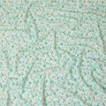 Light sea green cotton voile fabric with cream and turquoise green print in floral design-D16414