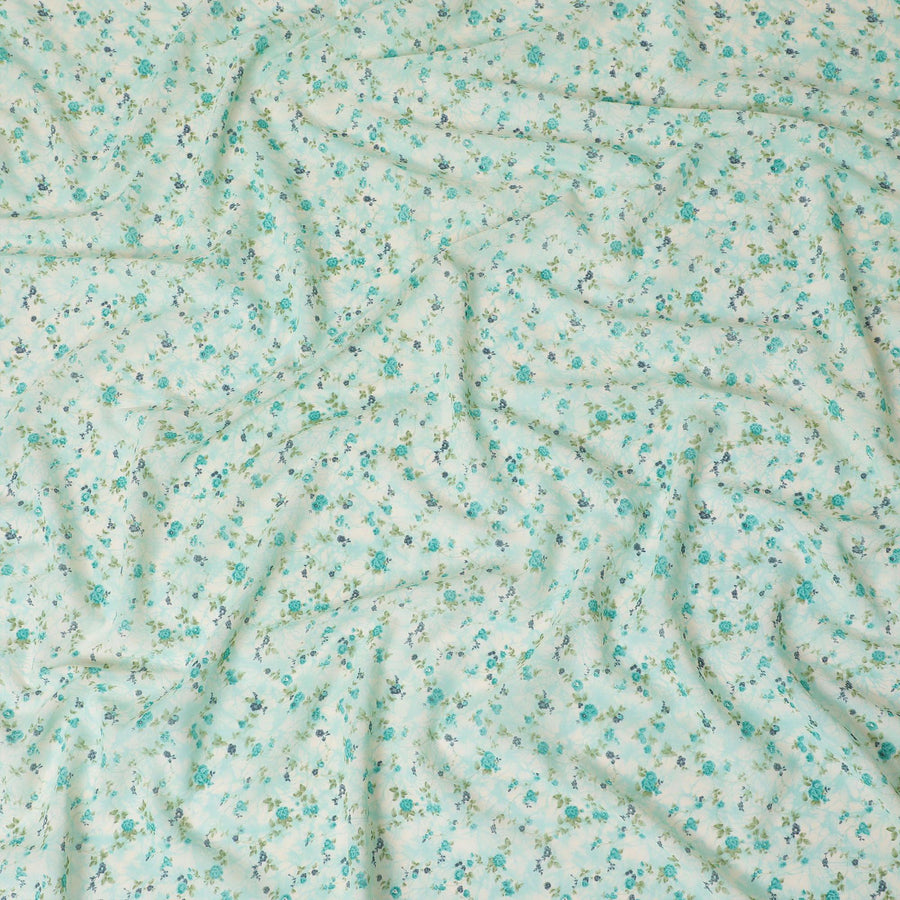 Light sea green cotton voile fabric with cream and turquoise green print in floral design-D16414
