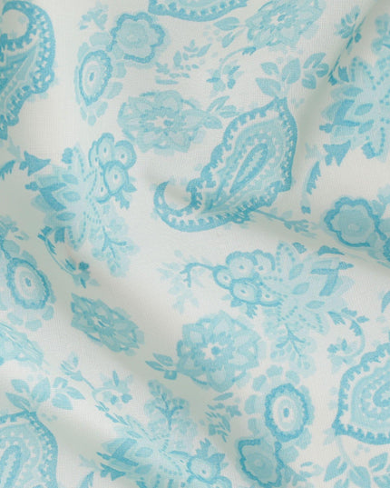 Off white cotton voile fabric with baby blue print in paisley design-D16417
