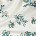 Cream cotton satin fabric with bottle green and gold print in floral design-D16419