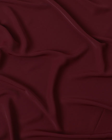 Maroon plain synthetic stretchable barbie crepe fabric-D17023