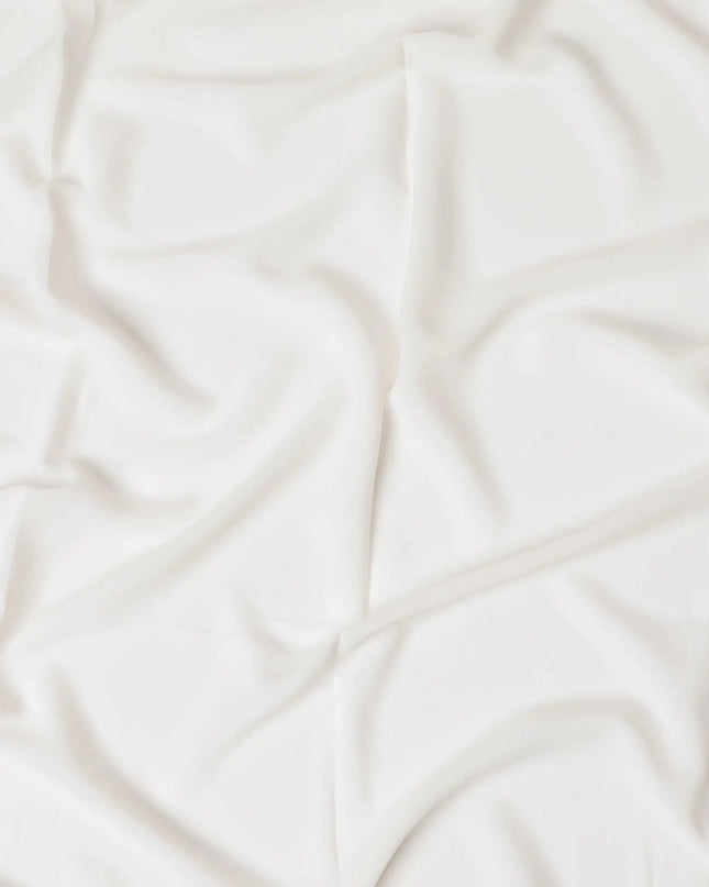 Cream synthetic plain butter crepe fabric-D17313 (2.75 mtrs) Regal Fabrics