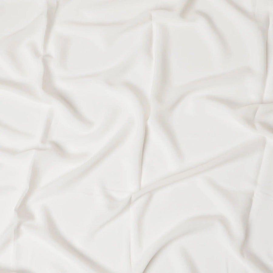 Cream synthetic plain butter crepe fabric-D17313 (2.75 mtrs) Regal Fabrics
