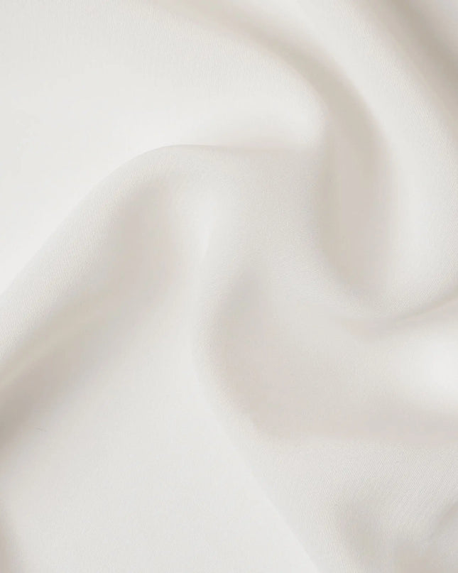 Cream synthetic plain butter crepe fabric-D17313 (2.75 mtrs) Regal Fabrics