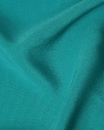 Jade blue plain synthetic crepe fabric-D17350 (1.6 mtrs)