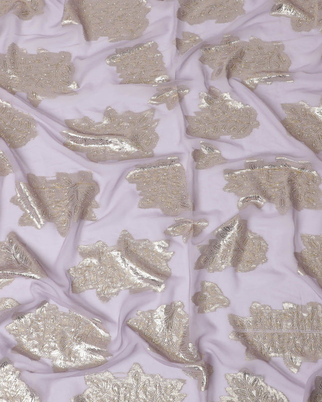 Light lilac synthetic chiffon fabric with gold metallic lurex having stone work in floral design-17360 (2.25 mtrs)