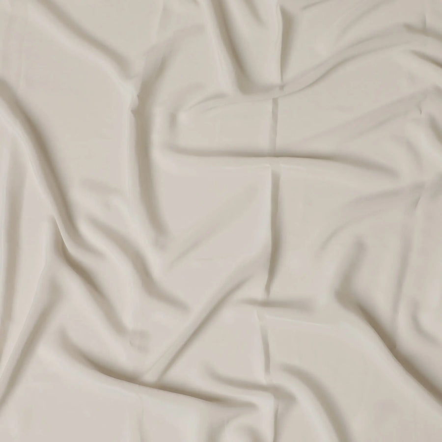 Beige Plain synthetic crepe fabric-D17412 (1.65 mtrs) Regal Fabrics